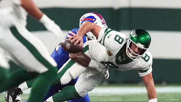 Jets' QB Aaron Rodgers is sacked by Bills' DE Leonard Floyd